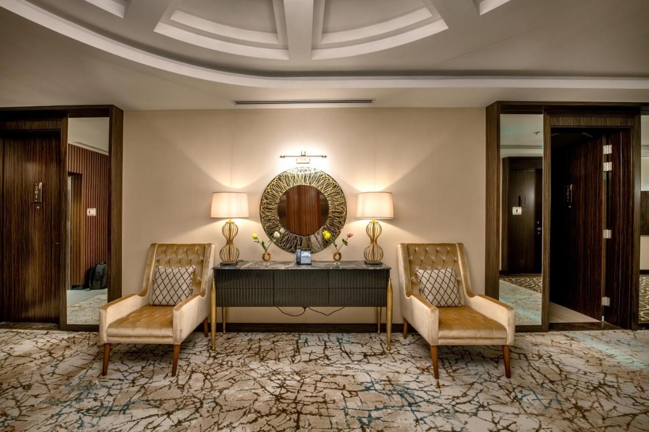Nivel Hotel Abha 海米斯穆谢特 外观 照片 The interior of a suite at the Ritz-Carlton, DIFC